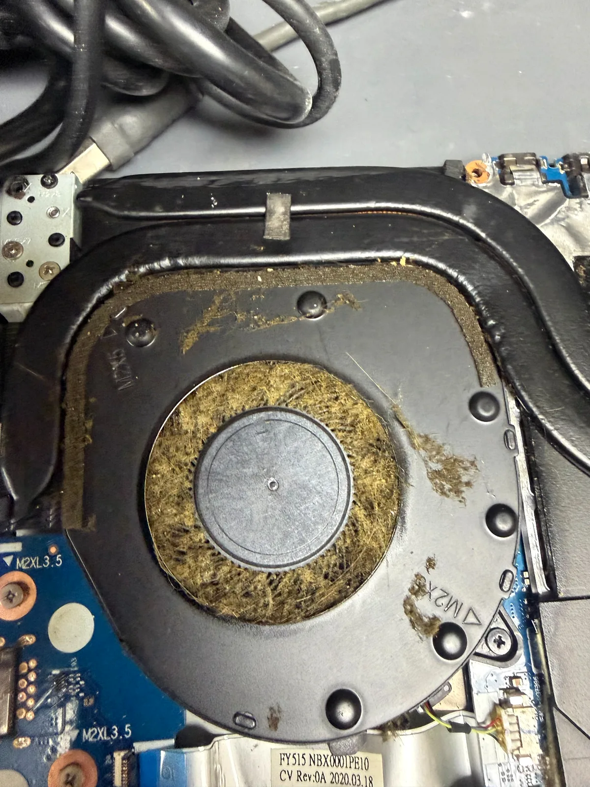 Dust clogged laptop fan before cleaning