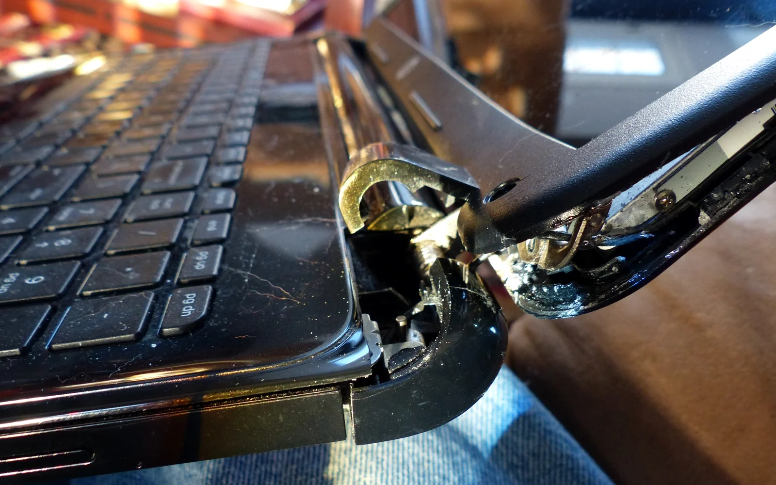 Broken laptop hinge and casing being repaired by Easy Computer Solutions in Chula Vista